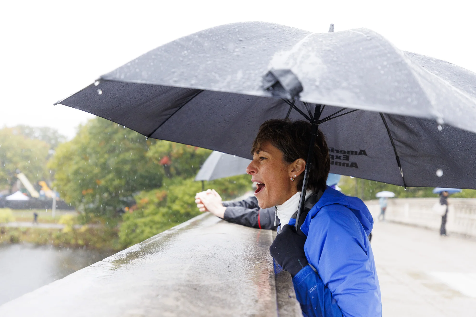 Leanne Blanchard, of Vermont, cheers on her father-in-law, David Blanchard, 81, during the Head of The Charles.