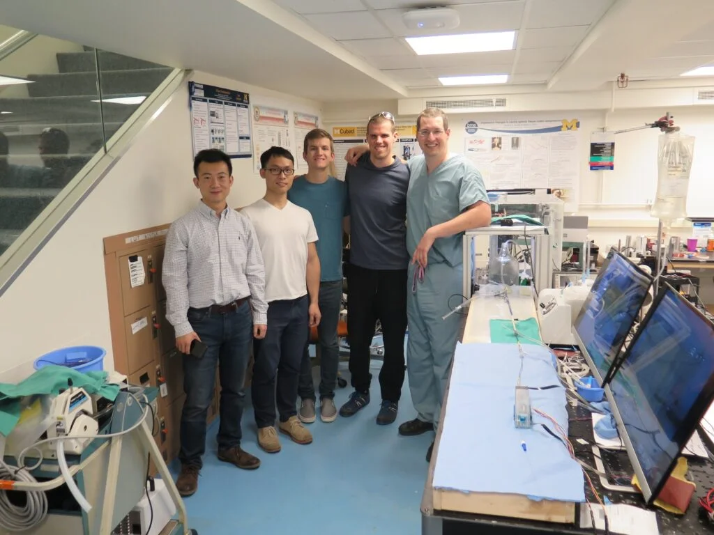 A group shot of the team during the development of the device at the University of Michigan. From the left, Yihao Zheng, Yang Liu, Joshua Cockrum, Jeff Plott, and Luis Savastano. Image courtesy: Luis Savastano.